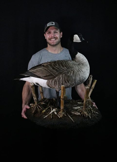Customer with their finished mount from Jason's Taxidermy