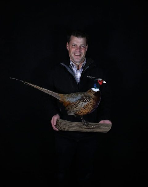 Customer with their finished mount from Jason's Taxidermy