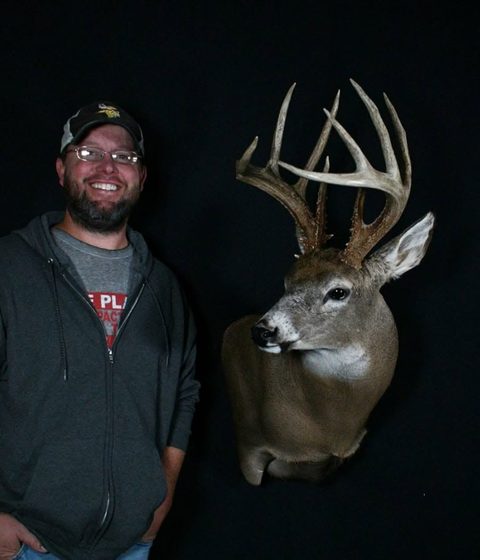 Customer with their finished mount from Jason's Taxidermy