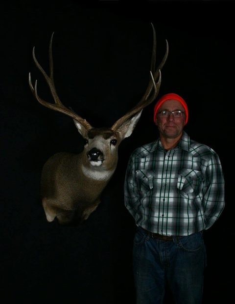 Customer with their finished mount from Jason's Taxidermy