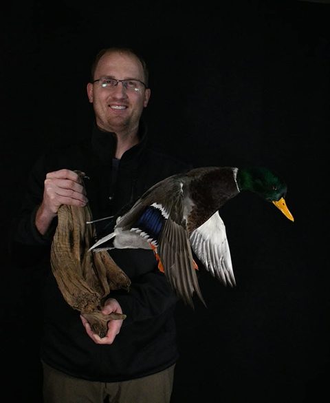 Customer with their finished mount from Jason's Taxidermy