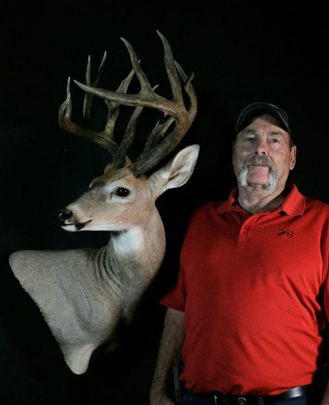 Customer with their finished mount from Jason's Taxidermy