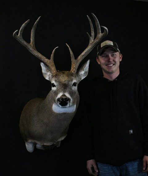 Customer with their finished mount from Jason's Taxidermy