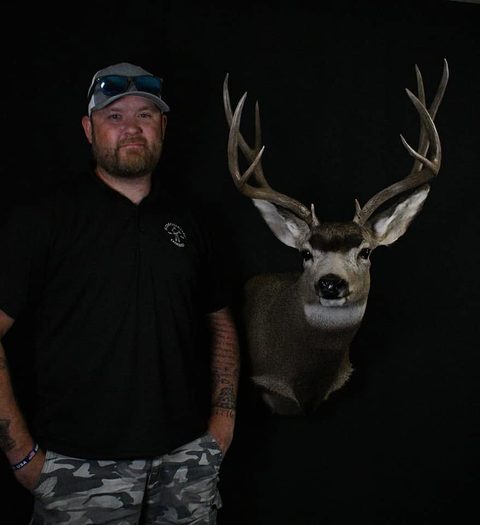 Customer with their finished mount from Jason's Taxidermy