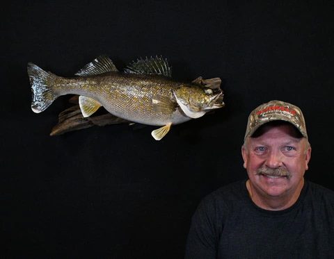 Customer with their finished mount from Jason's Taxidermy