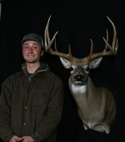 Customer with their finished mount from Jason's Taxidermy