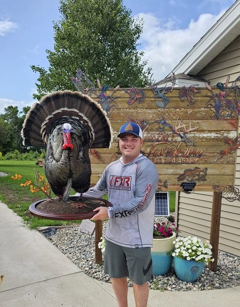 Customer with their finished mount from Jason's Taxidermy
