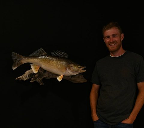 Customer with their finished mount from Jason's Taxidermy