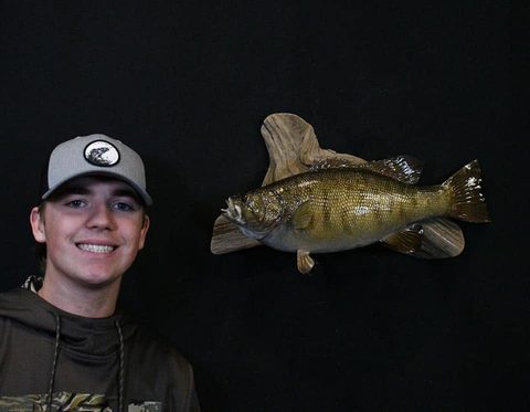 Customer with their finished mount from Jason's Taxidermy