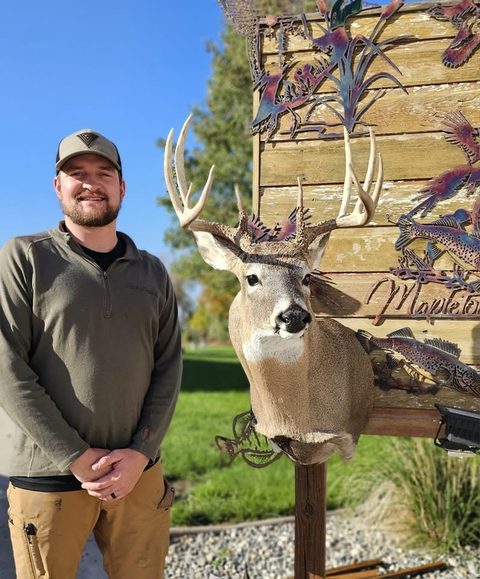 Customer with their finished mount from Jason's Taxidermy