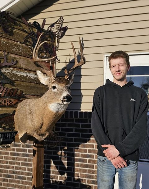 Customer with their finished mount from Jason's Taxidermy