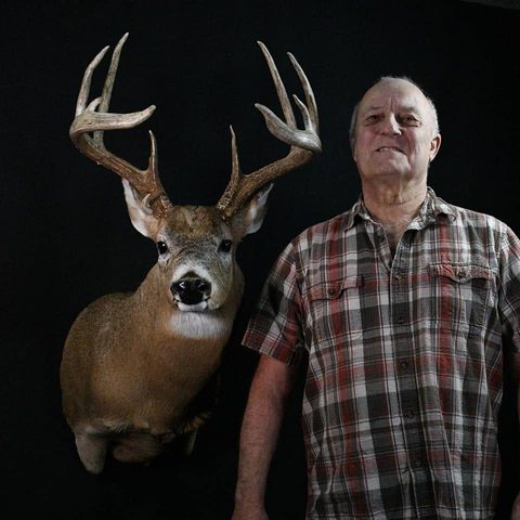 Customer with their finished mount from Jason's Taxidermy