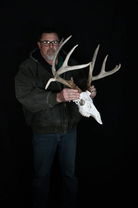 Customer with their finished mount from Jason's Taxidermy