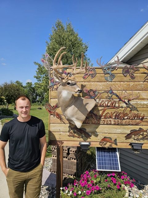 Customer with their finished mount from Jason's Taxidermy