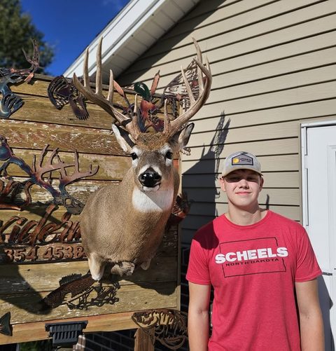 Customer with their finished mount from Jason's Taxidermy