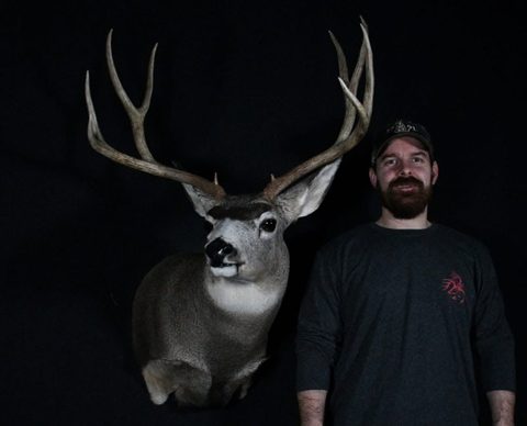 Customer with their finished mount from Jason's Taxidermy