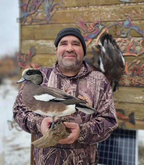 Customer with their finished mount from Jason's Taxidermy