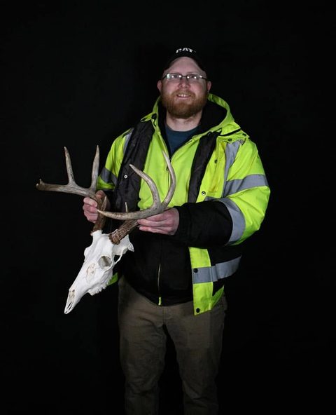 Customer with their finished mount from Jason's Taxidermy