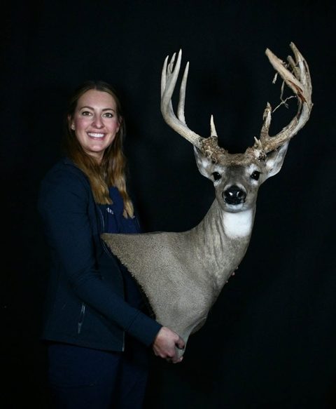 Customer with their finished mount from Jason's Taxidermy