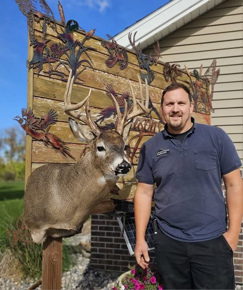 Customer with their finished mount from Jason's Taxidermy