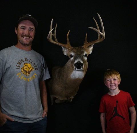 Customer with their finished mount from Jason's Taxidermy