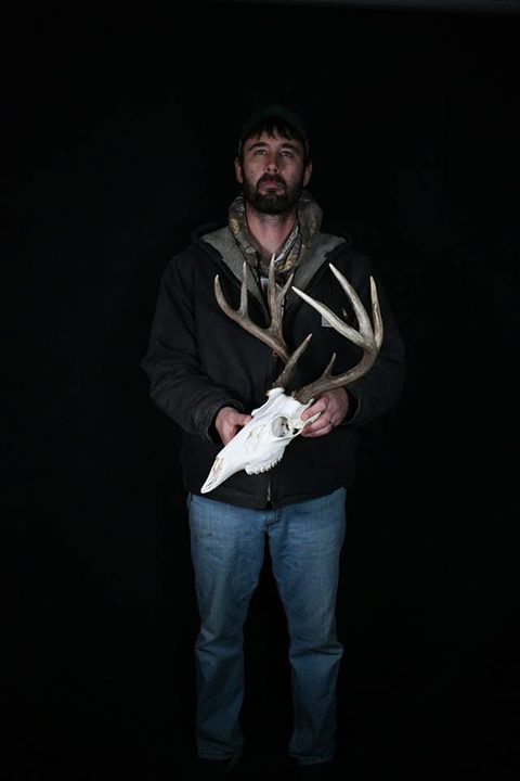 Customer with their finished mount from Jason's Taxidermy