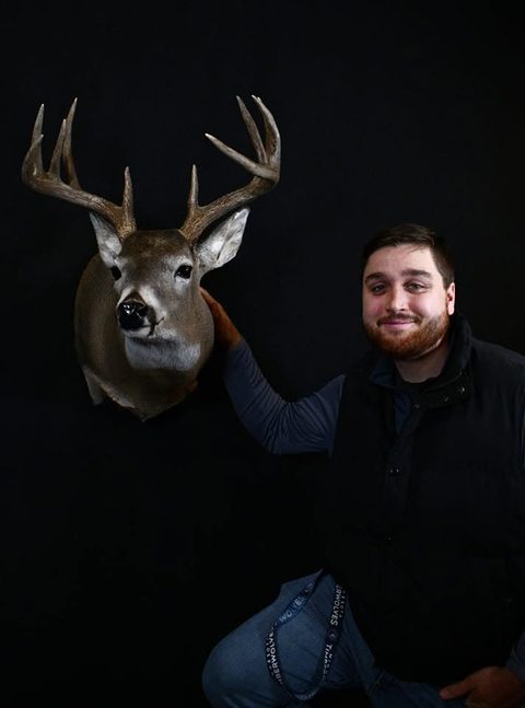 Customer with their finished mount from Jason's Taxidermy