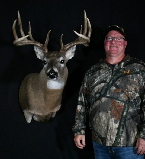 Customer with their finished mount from Jason's Taxidermy