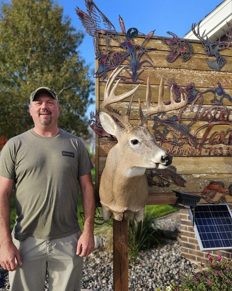 Customer with their finished mount from Jason's Taxidermy