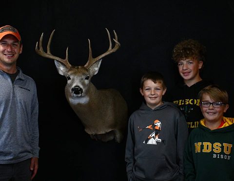 Customer with their finished mount from Jason's Taxidermy