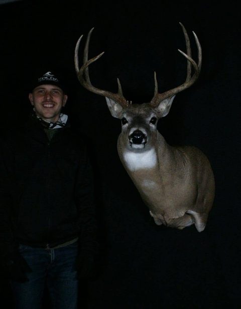 Customer with their finished mount from Jason's Taxidermy