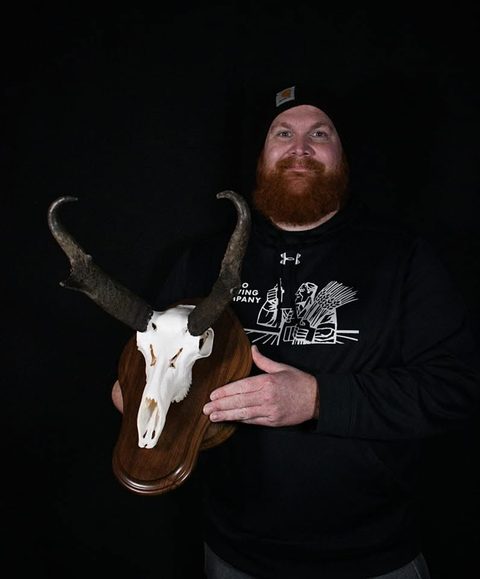 Customer with their finished mount from Jason's Taxidermy