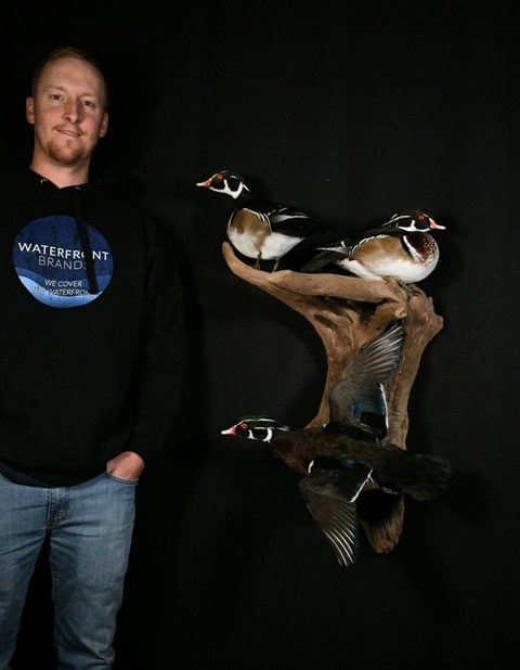 Customer with their finished mount from Jason's Taxidermy