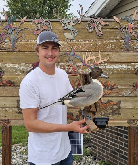 Customer with their finished mount from Jason's Taxidermy