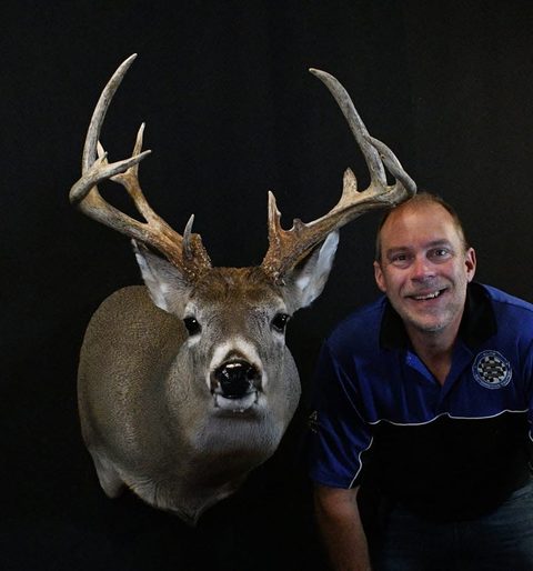 Customer with their finished mount from Jason's Taxidermy
