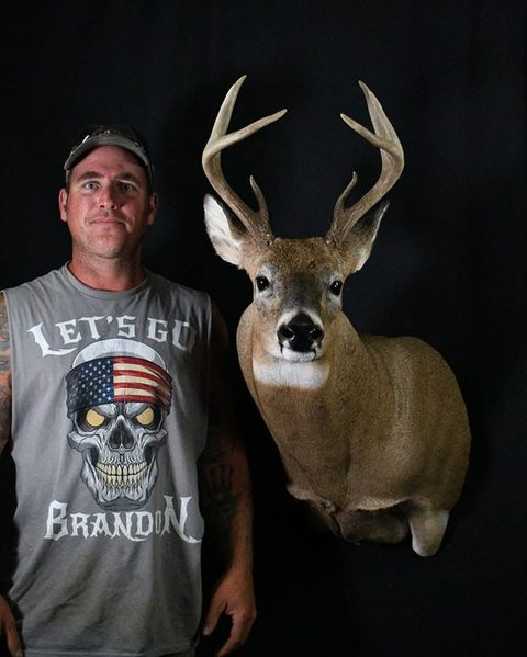 Customer with their finished mount from Jason's Taxidermy