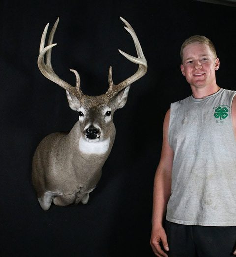 Customer with their finished mount from Jason's Taxidermy