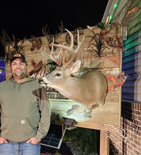Customer with their finished mount from Jason's Taxidermy
