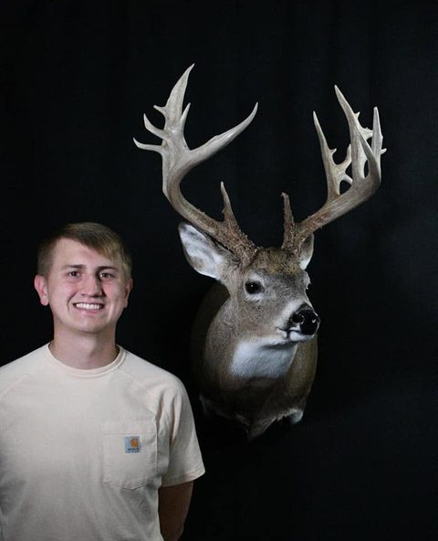 Customer with their finished mount from Jason's Taxidermy