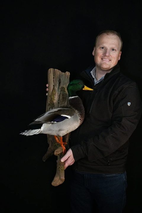 Customer with their finished mount from Jason's Taxidermy