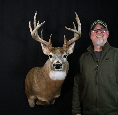 Customer with their finished mount from Jason's Taxidermy