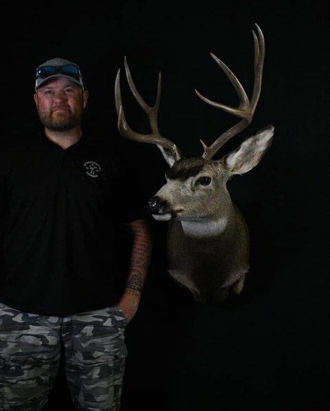 Customer with their finished mount from Jason's Taxidermy