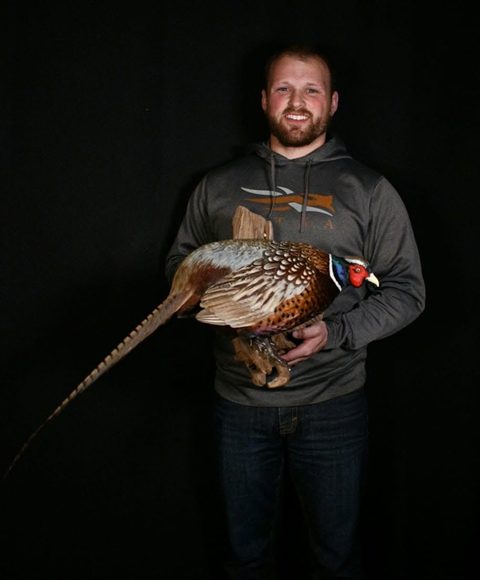 Customer with their finished mount from Jason's Taxidermy