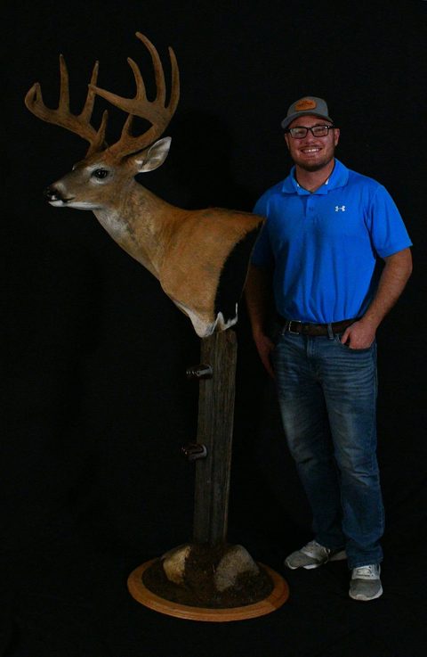 Customer with their finished mount from Jason's Taxidermy