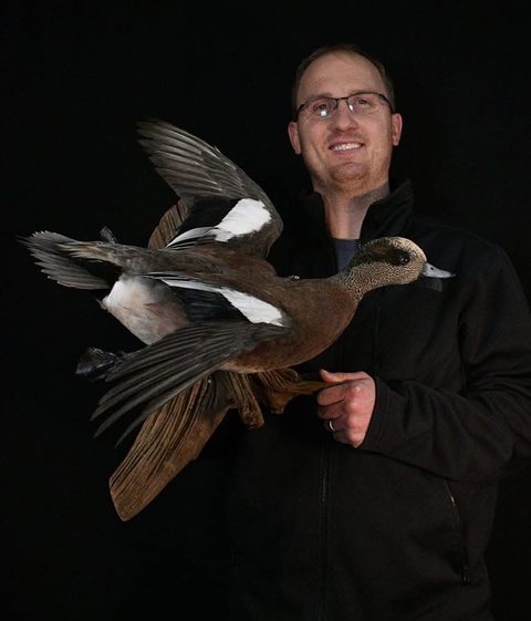 Customer with their finished mount from Jason's Taxidermy