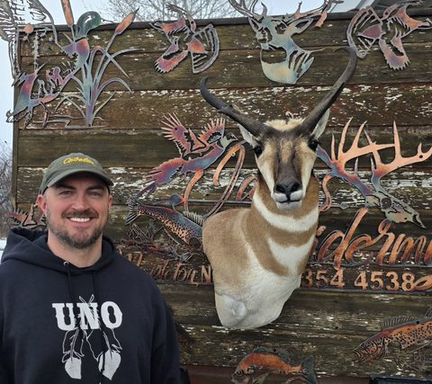 Customer with their finished mount from Jason's Taxidermy