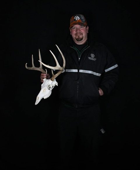 Customer with their finished mount from Jason's Taxidermy