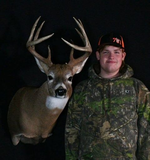 Customer with their finished mount from Jason's Taxidermy