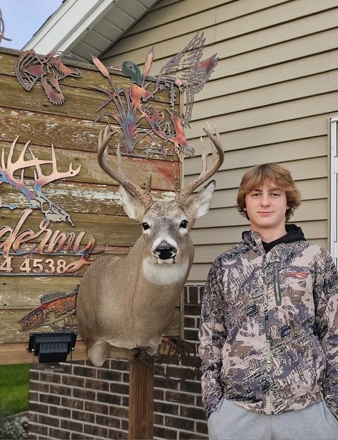 Customer with their finished mount from Jason's Taxidermy