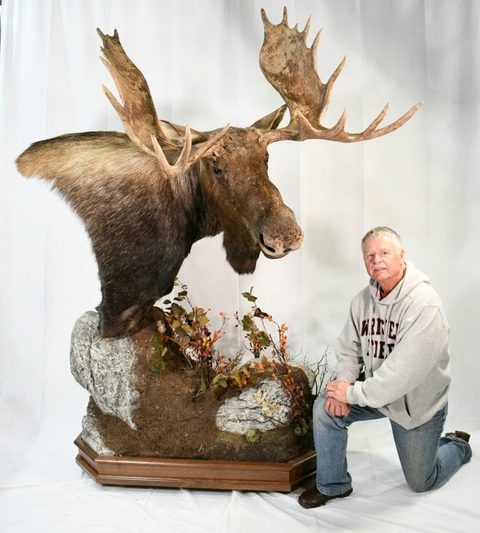 Customer with their finished mount from Jason's Taxidermy